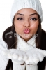 stock-photo-14263335-woman-wearing-winter-clothing-blowing-a-kiss.jpg